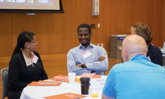 Group of faculty around a table.