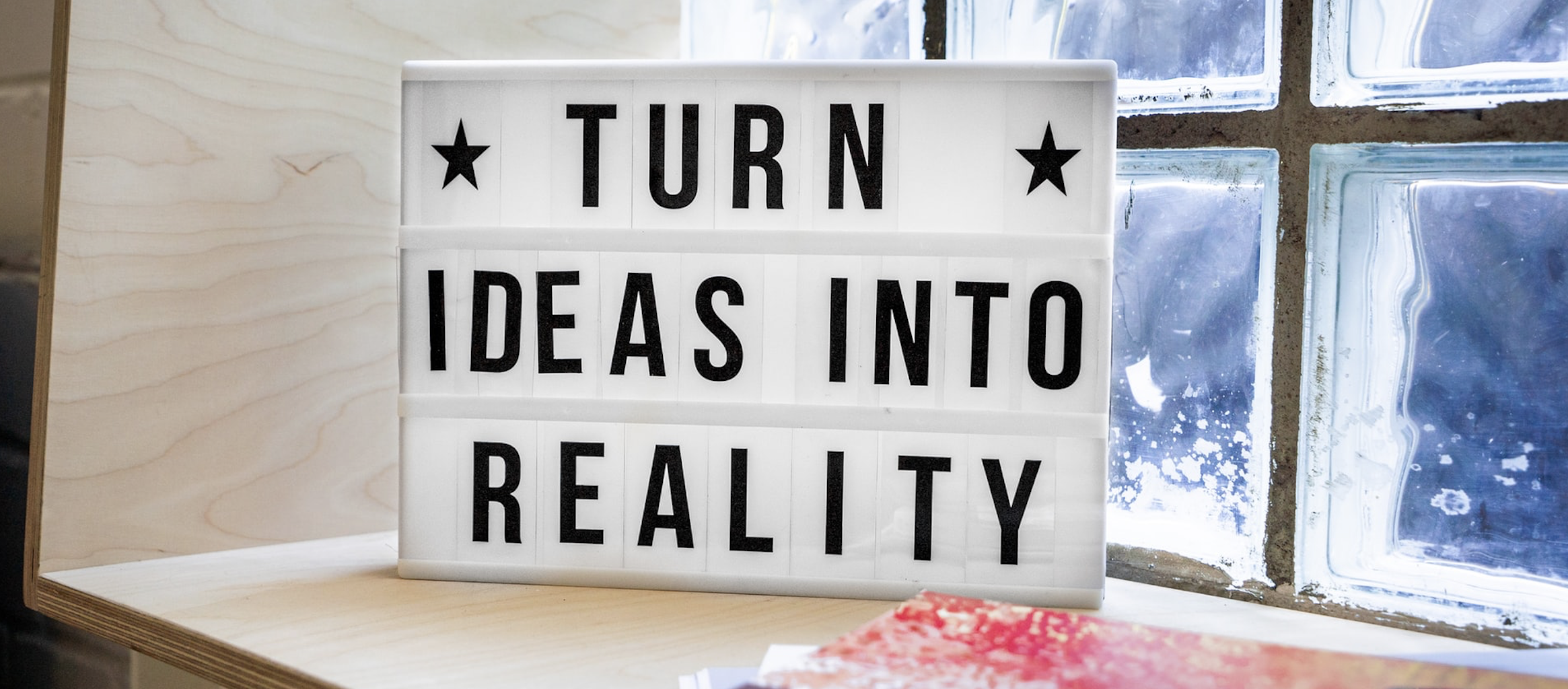 Turn Dreams Into Reality sign