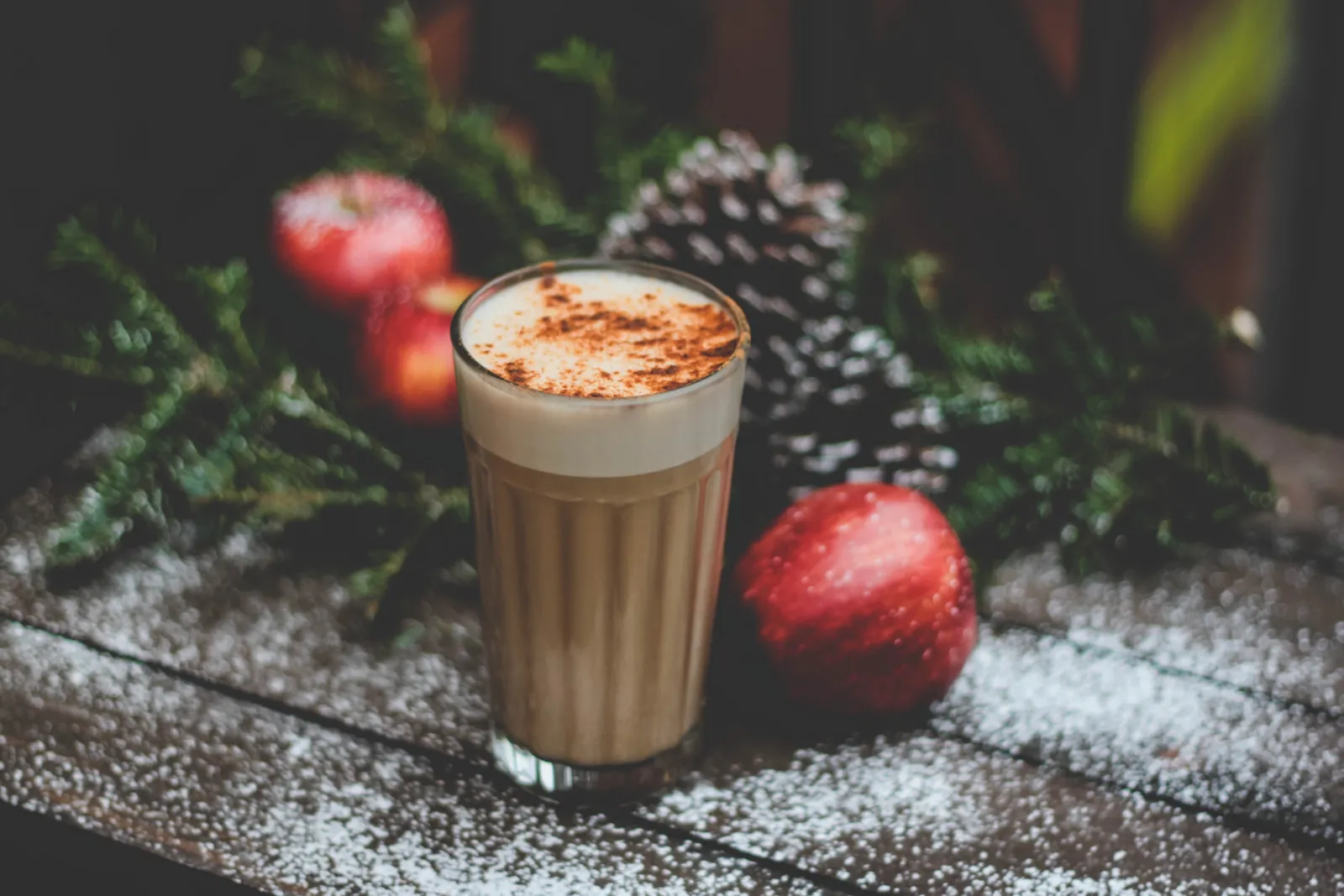 Drink next to apples and plants