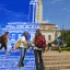 Small image of blueprint image with students talking in front of UT Tower