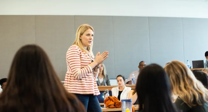 Female professor teaching class