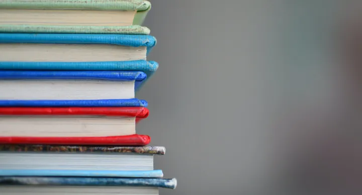 A stack of multicolored books