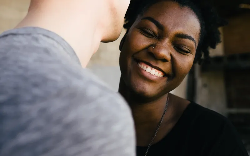 Two people enjoying a laugh - take care of yourself